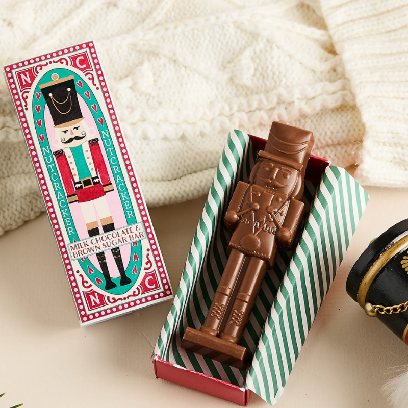 Chocolate nutcracker in a decorative box with a Nutcracker Soldier design on the packaging.